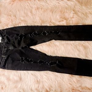 Levis 711 31 x 30 ripped stretch jeans